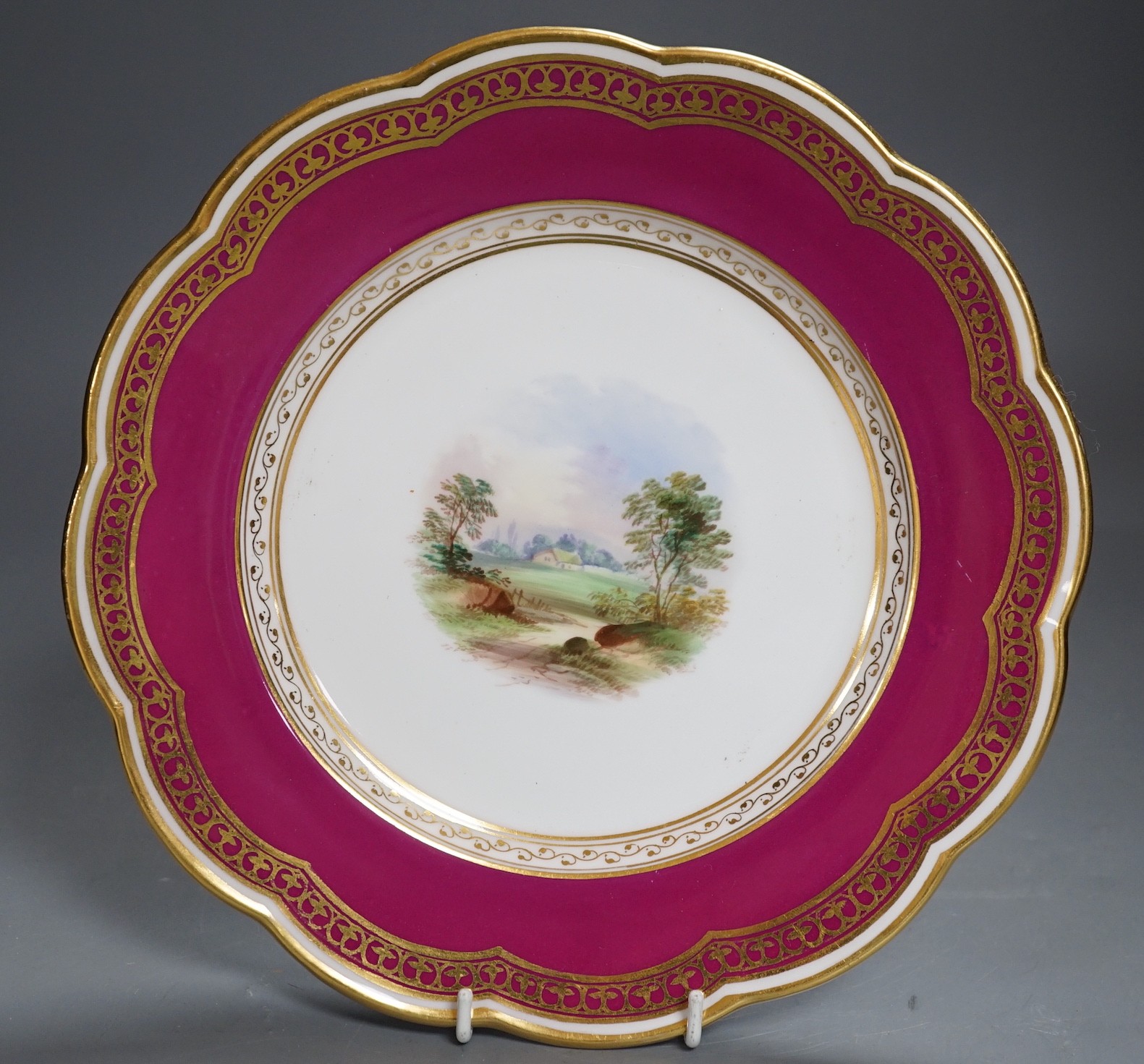 A 19th century Davenport cerise ground dessert set, (15)